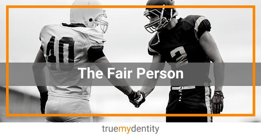 two American football players in uniform being fair person shake hands after playing game True Mydentity.jpg